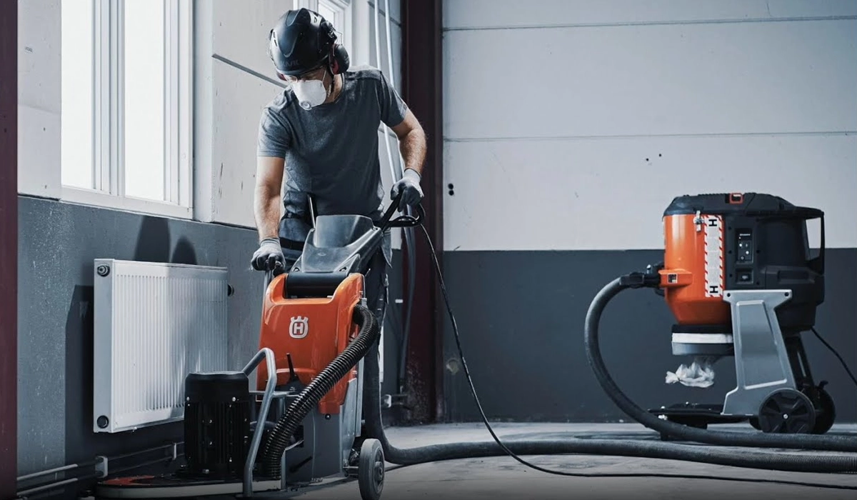 Floor grinder being used for concrete surface preparation